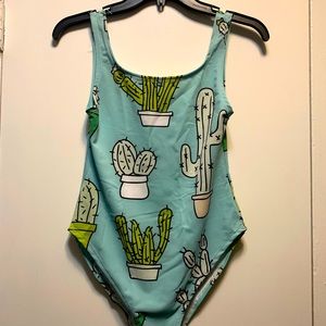 Unworn one piece bathing suit